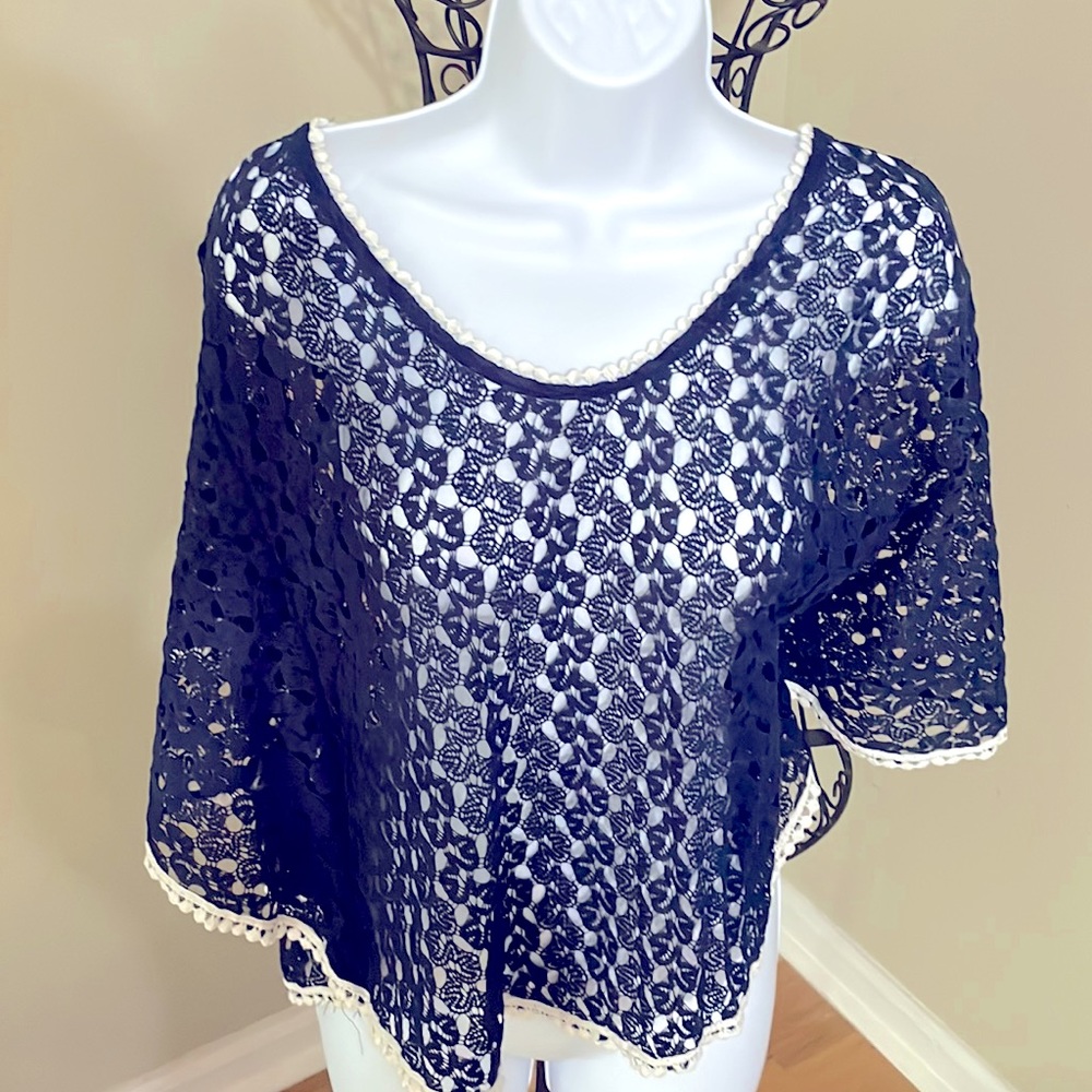 Navy blue and white laced Pancho.